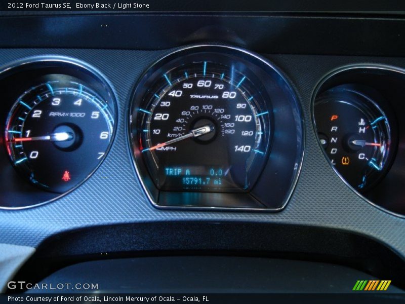 Ebony Black / Light Stone 2012 Ford Taurus SE