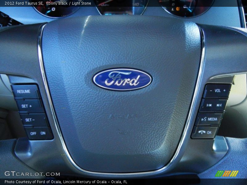 Ebony Black / Light Stone 2012 Ford Taurus SE