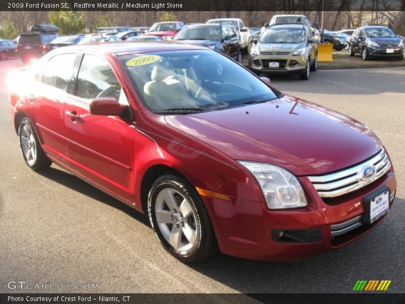 Redfire Metallic / Medium Light Stone 2009 Ford Fusion SE