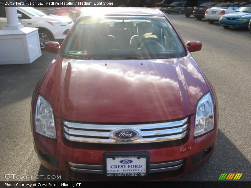 Redfire Metallic / Medium Light Stone 2009 Ford Fusion SE