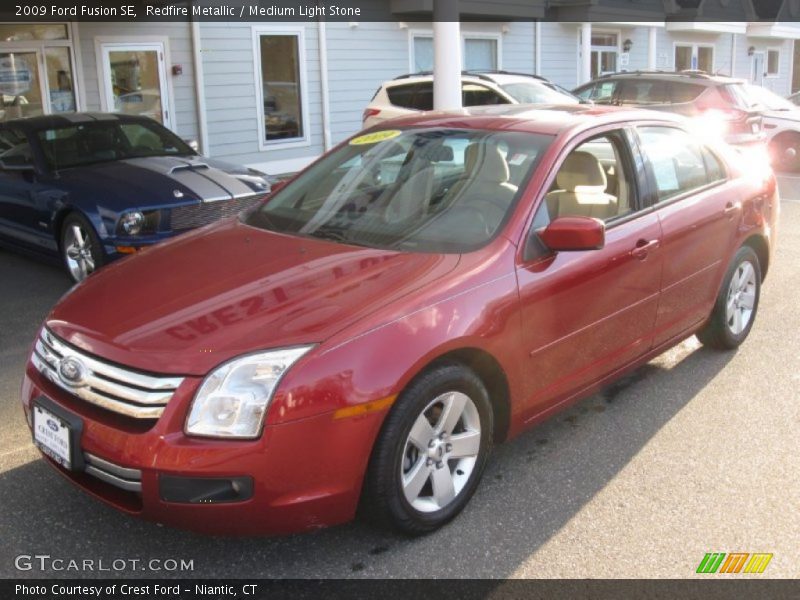 Redfire Metallic / Medium Light Stone 2009 Ford Fusion SE
