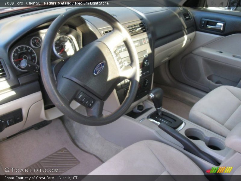 Redfire Metallic / Medium Light Stone 2009 Ford Fusion SE