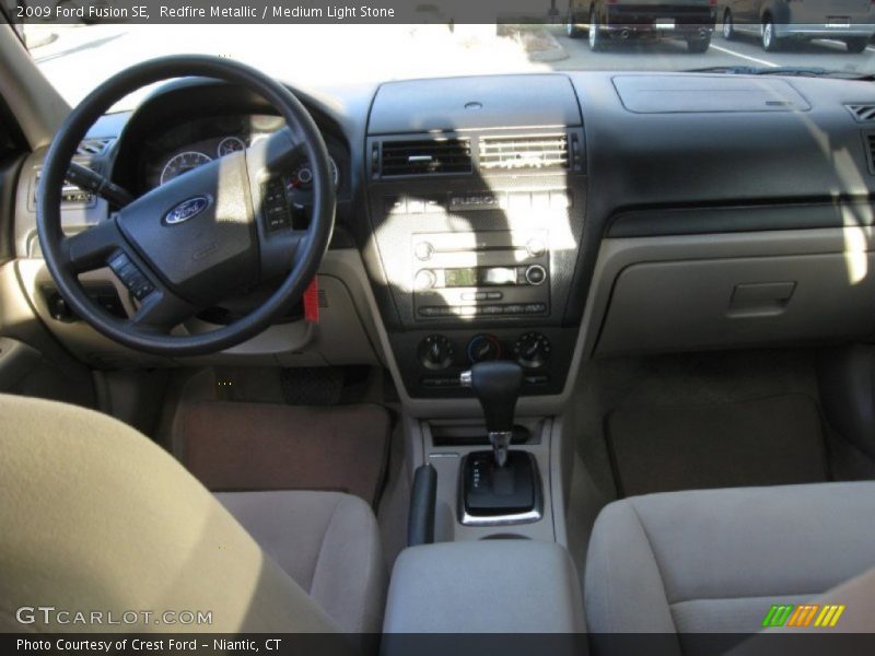 Redfire Metallic / Medium Light Stone 2009 Ford Fusion SE