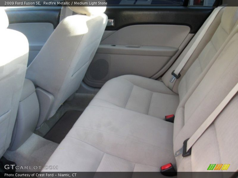 Redfire Metallic / Medium Light Stone 2009 Ford Fusion SE