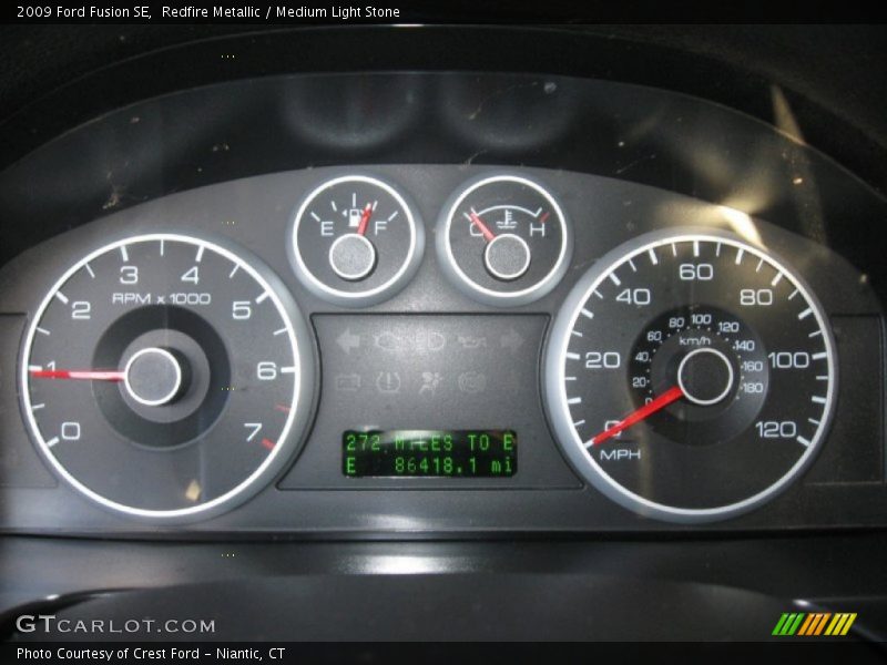 Redfire Metallic / Medium Light Stone 2009 Ford Fusion SE