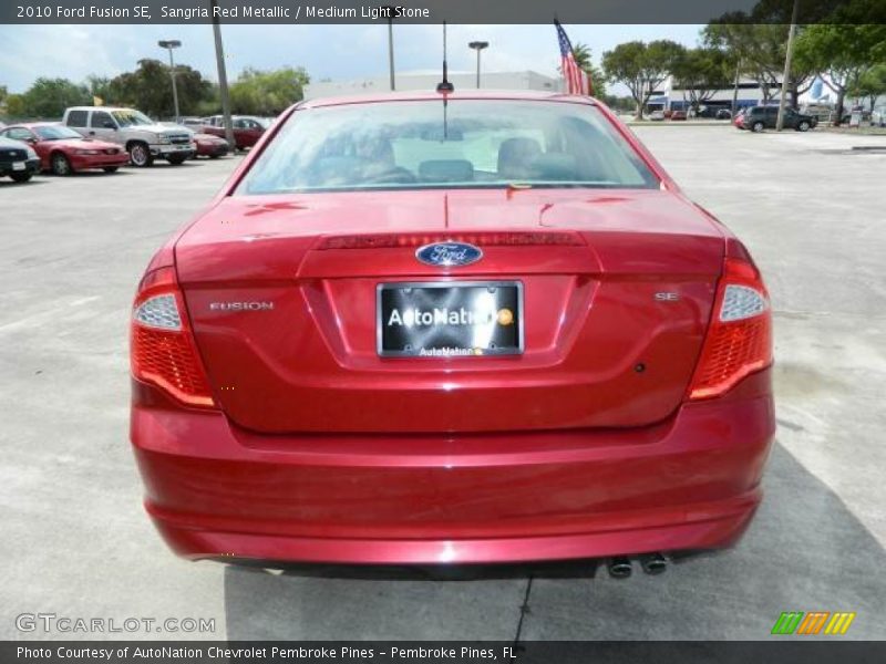 Sangria Red Metallic / Medium Light Stone 2010 Ford Fusion SE