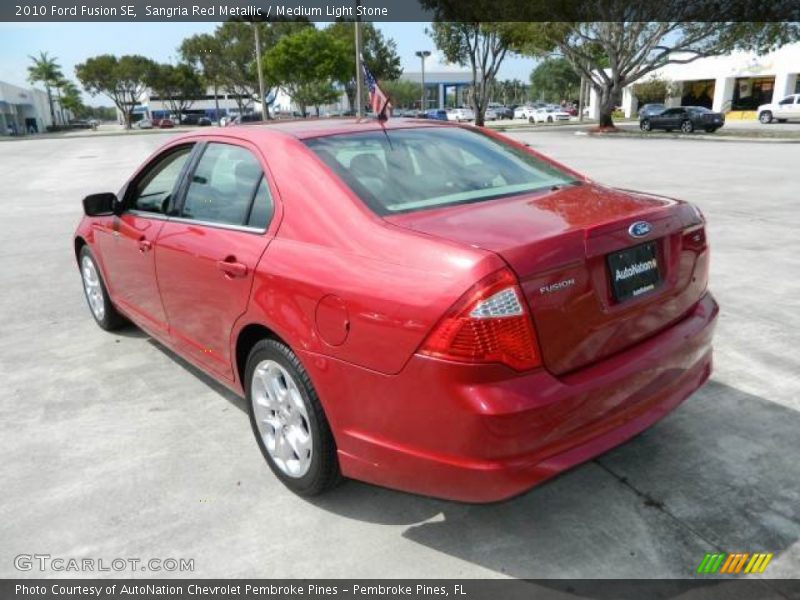 Sangria Red Metallic / Medium Light Stone 2010 Ford Fusion SE