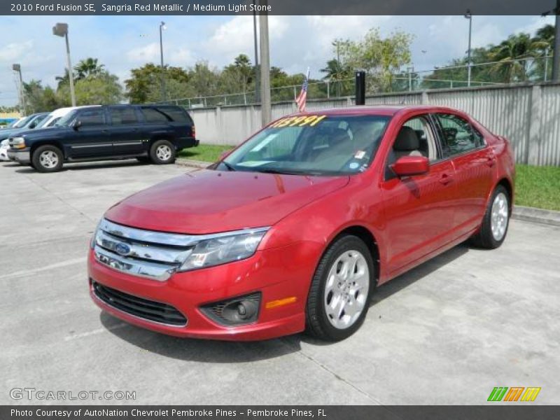 Sangria Red Metallic / Medium Light Stone 2010 Ford Fusion SE