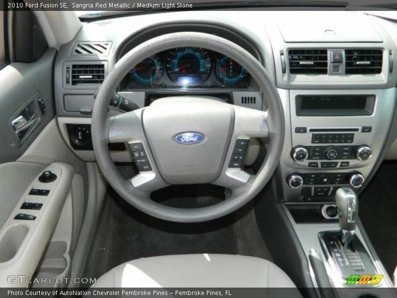Sangria Red Metallic / Medium Light Stone 2010 Ford Fusion SE