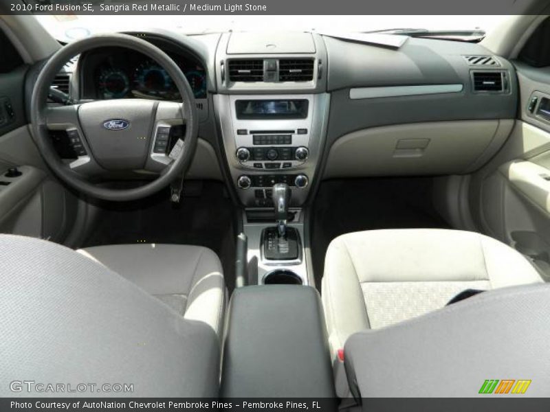 Sangria Red Metallic / Medium Light Stone 2010 Ford Fusion SE