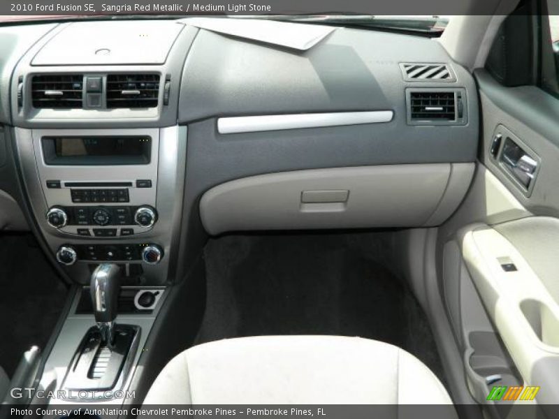 Sangria Red Metallic / Medium Light Stone 2010 Ford Fusion SE