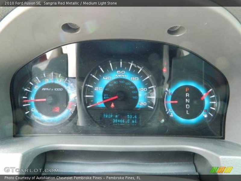 Sangria Red Metallic / Medium Light Stone 2010 Ford Fusion SE