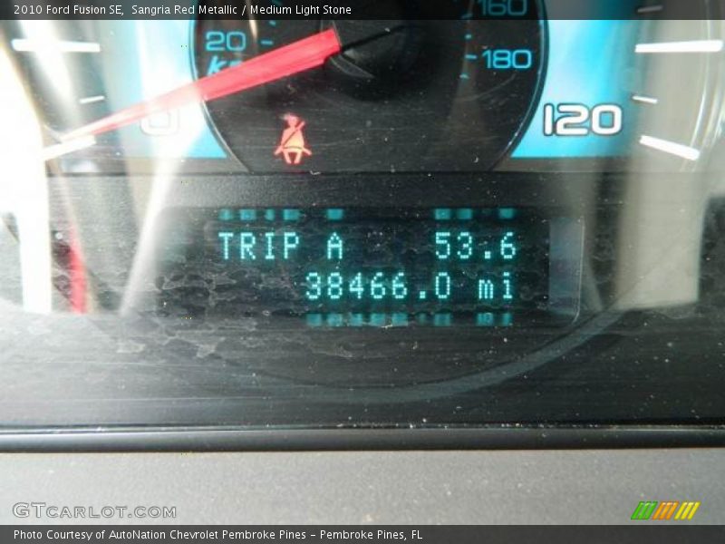 Sangria Red Metallic / Medium Light Stone 2010 Ford Fusion SE