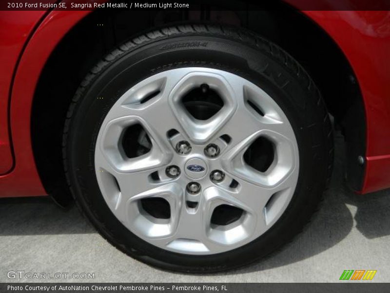 Sangria Red Metallic / Medium Light Stone 2010 Ford Fusion SE