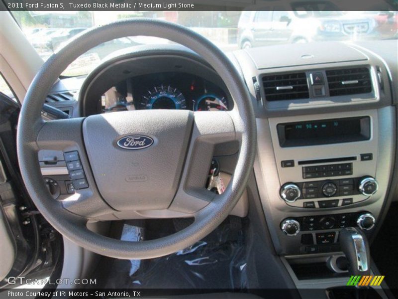 Tuxedo Black Metallic / Medium Light Stone 2011 Ford Fusion S