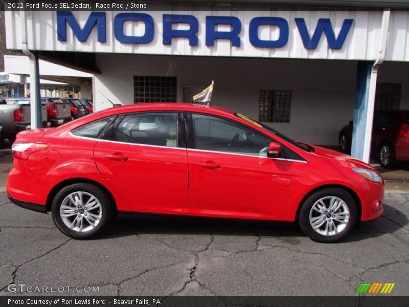 Race Red / Stone 2012 Ford Focus SEL Sedan