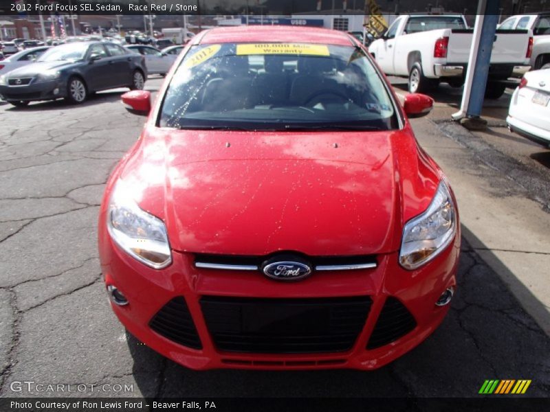 Race Red / Stone 2012 Ford Focus SEL Sedan
