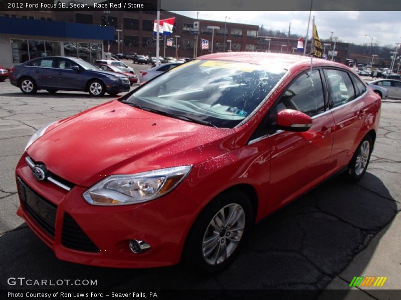 Race Red / Stone 2012 Ford Focus SEL Sedan