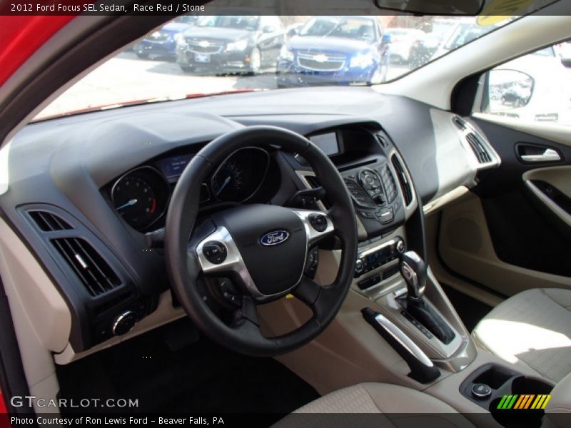 Race Red / Stone 2012 Ford Focus SEL Sedan