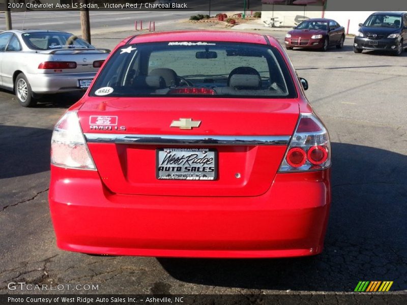 Victory Red / Charcoal Black 2007 Chevrolet Aveo LS Sedan