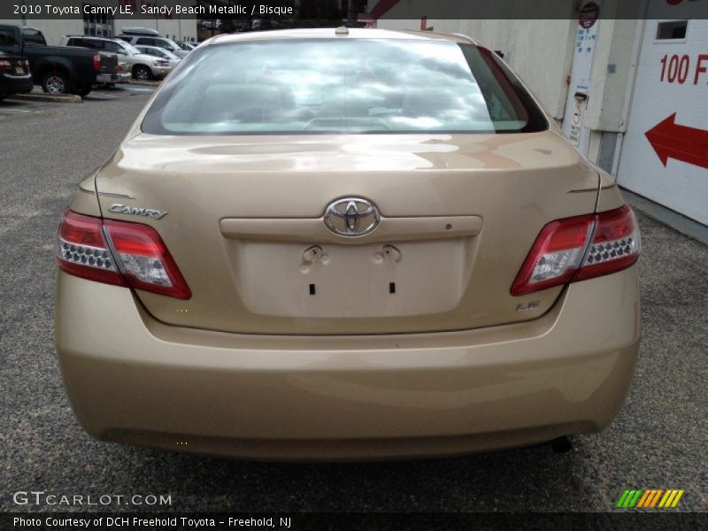 Sandy Beach Metallic / Bisque 2010 Toyota Camry LE