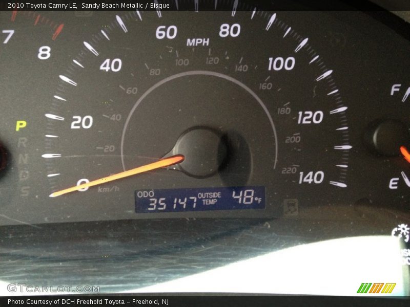 Sandy Beach Metallic / Bisque 2010 Toyota Camry LE