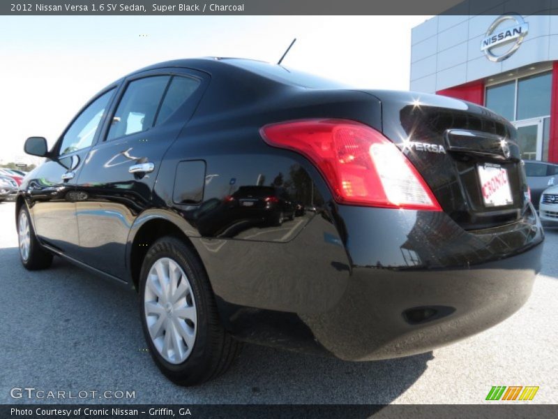 Super Black / Charcoal 2012 Nissan Versa 1.6 SV Sedan
