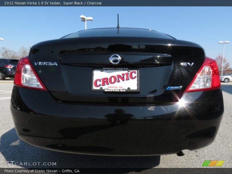 Super Black / Charcoal 2012 Nissan Versa 1.6 SV Sedan