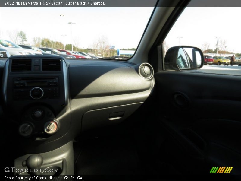 Super Black / Charcoal 2012 Nissan Versa 1.6 SV Sedan