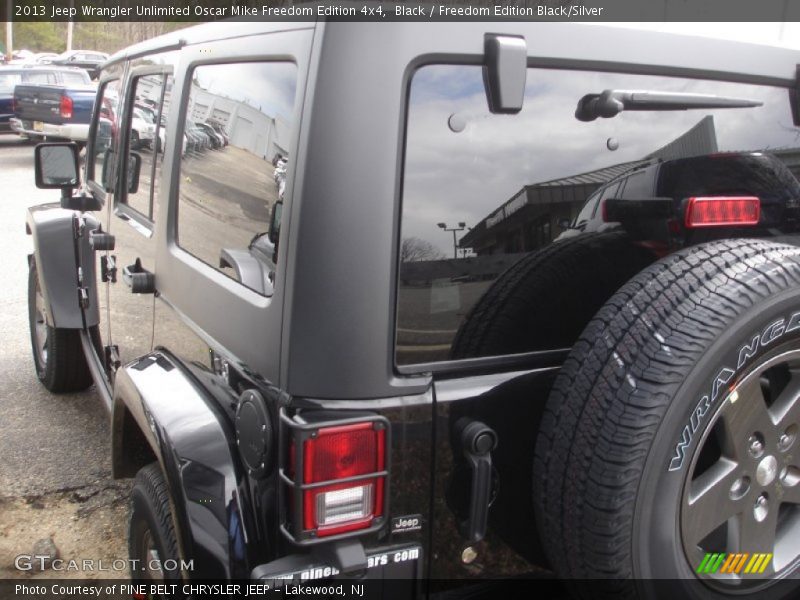 Black / Freedom Edition Black/Silver 2013 Jeep Wrangler Unlimited Oscar Mike Freedom Edition 4x4