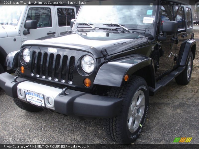 Black / Black 2013 Jeep Wrangler Unlimited Sahara 4x4