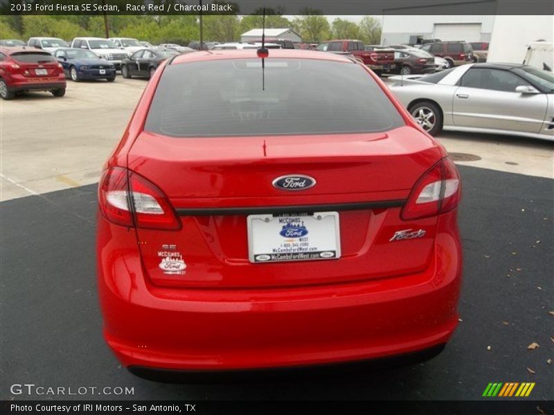 Race Red / Charcoal Black 2013 Ford Fiesta SE Sedan