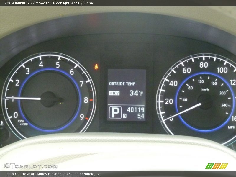Moonlight White / Stone 2009 Infiniti G 37 x Sedan
