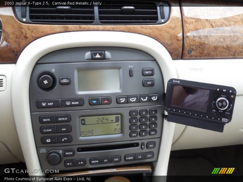 Carnival Red Metallic / Ivory 2003 Jaguar X-Type 2.5