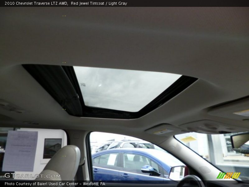 Red Jewel Tintcoat / Light Gray 2010 Chevrolet Traverse LTZ AWD
