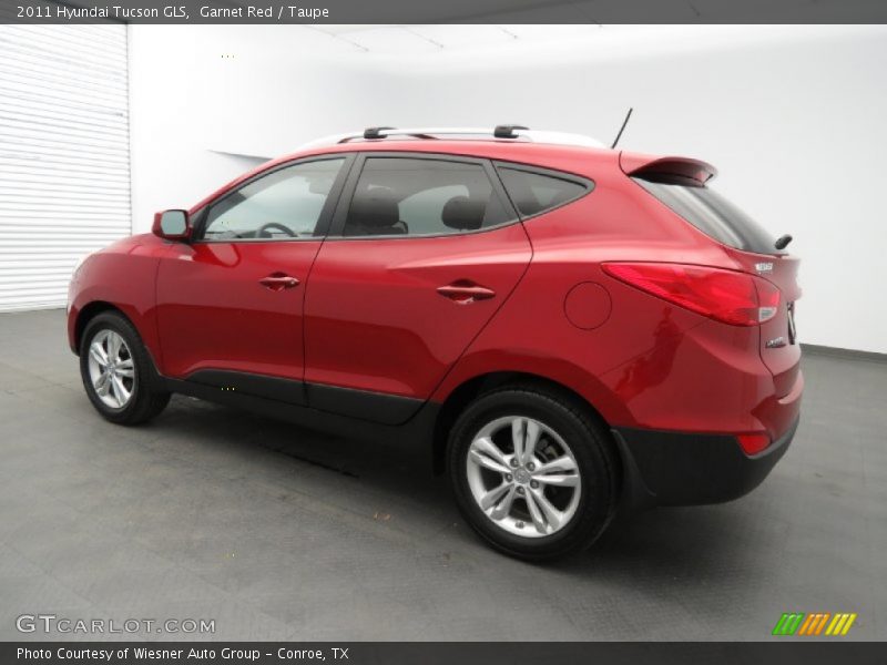 Garnet Red / Taupe 2011 Hyundai Tucson GLS