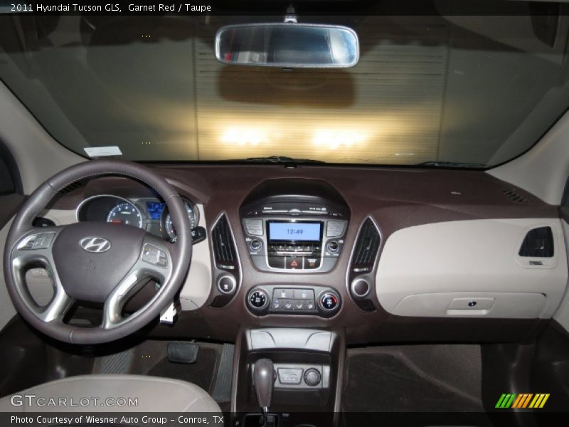 Garnet Red / Taupe 2011 Hyundai Tucson GLS
