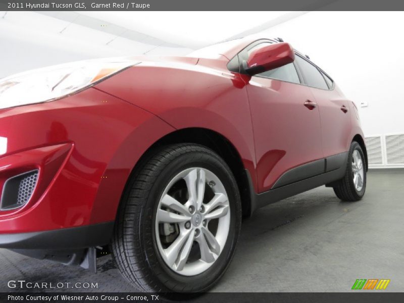 Garnet Red / Taupe 2011 Hyundai Tucson GLS