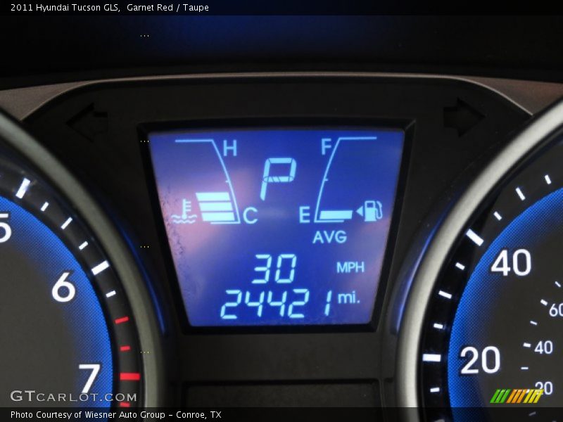 Garnet Red / Taupe 2011 Hyundai Tucson GLS