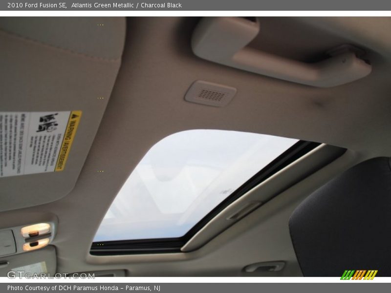 Atlantis Green Metallic / Charcoal Black 2010 Ford Fusion SE
