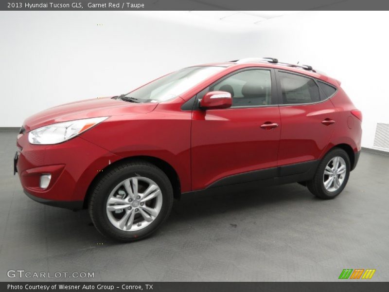 Garnet Red / Taupe 2013 Hyundai Tucson GLS