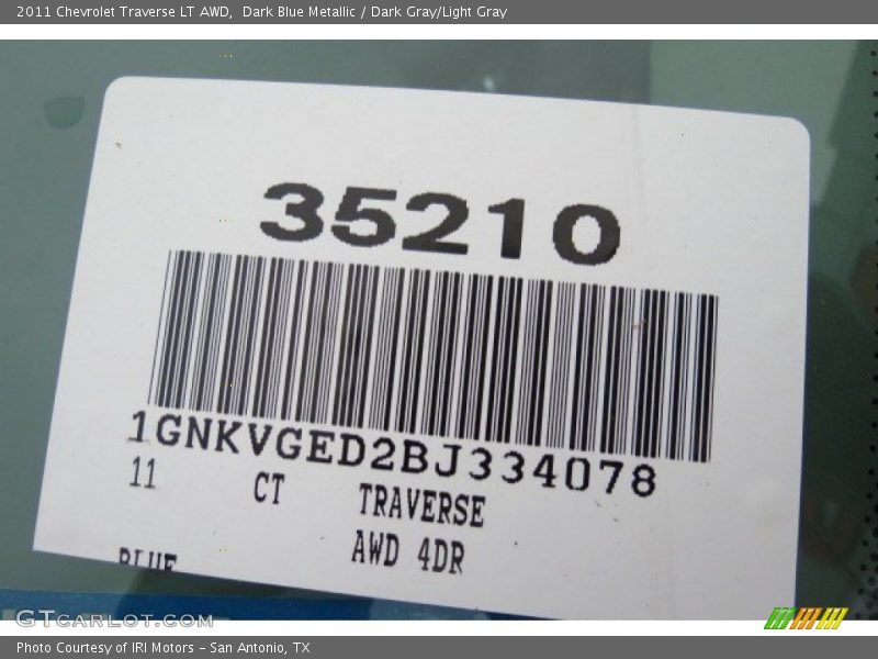 Dark Blue Metallic / Dark Gray/Light Gray 2011 Chevrolet Traverse LT AWD
