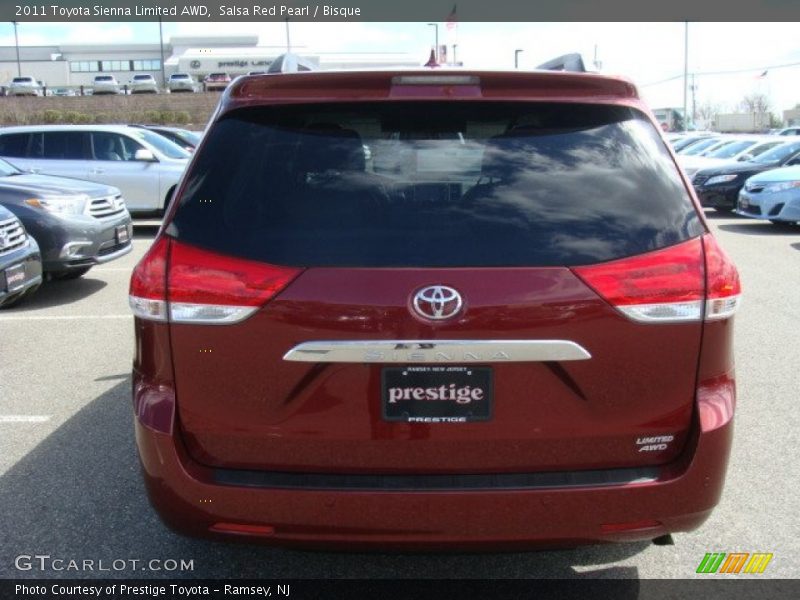 Salsa Red Pearl / Bisque 2011 Toyota Sienna Limited AWD