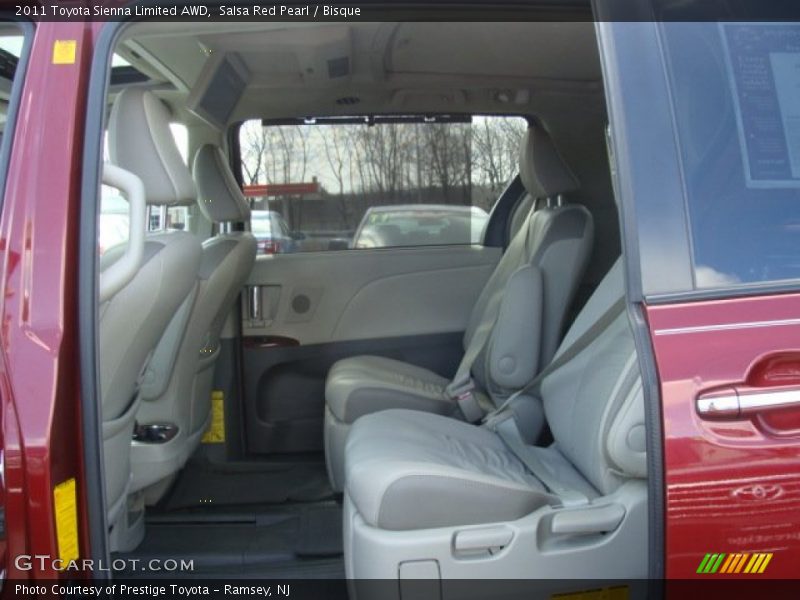 Salsa Red Pearl / Bisque 2011 Toyota Sienna Limited AWD