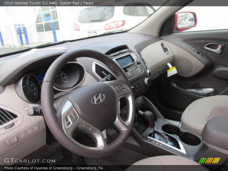 Garnet Red / Taupe 2013 Hyundai Tucson GLS AWD