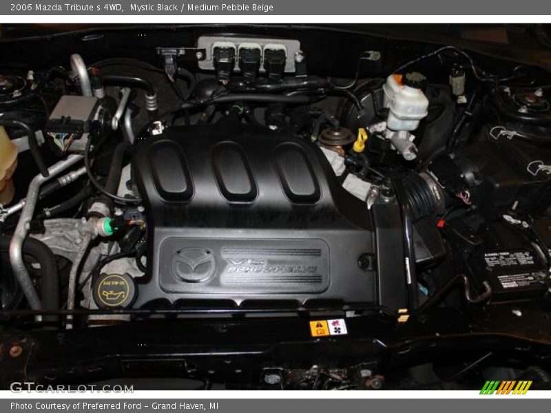 Mystic Black / Medium Pebble Beige 2006 Mazda Tribute s 4WD