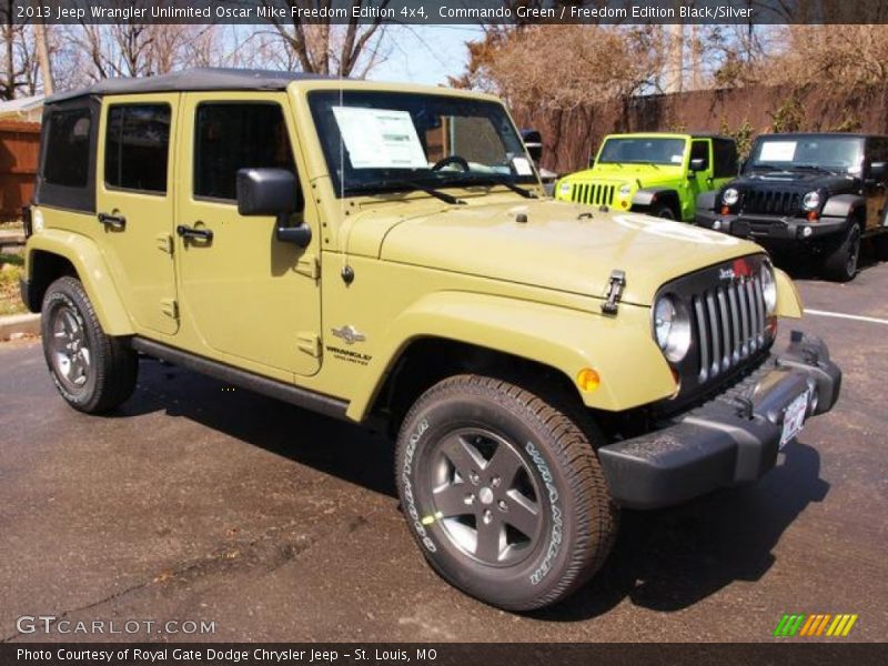 Front 3/4 View of 2013 Wrangler Unlimited Oscar Mike Freedom Edition 4x4
