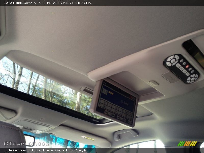 Polished Metal Metallic / Gray 2010 Honda Odyssey EX-L