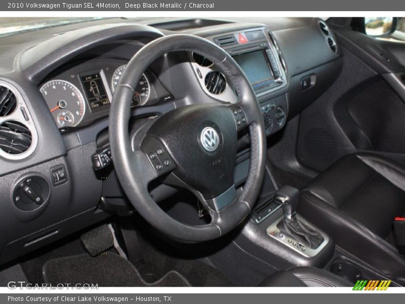 Deep Black Metallic / Charcoal 2010 Volkswagen Tiguan SEL 4Motion