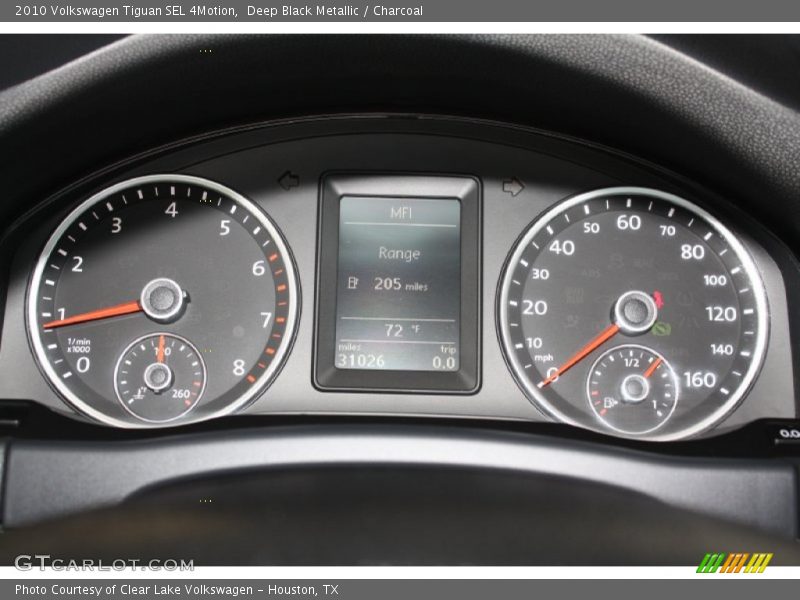 Deep Black Metallic / Charcoal 2010 Volkswagen Tiguan SEL 4Motion